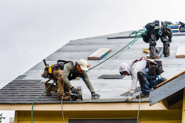 Professional Roofing technician working in Springvale, ME